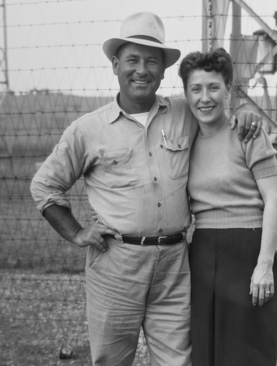 Cropped restored portrait of Papa Birdwell and Big Mama together, smiling with his arm over her shoulder