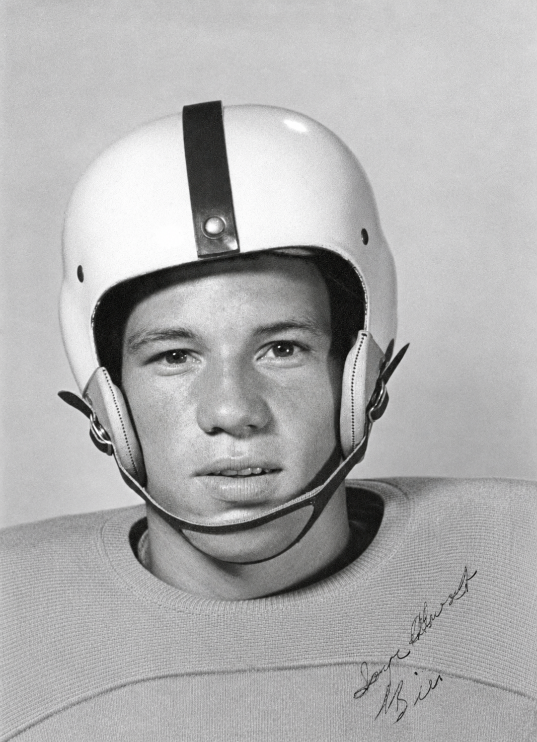 Conservatively restored black-and-white football portrait of young Billy Joe Hollingsworth Sr.