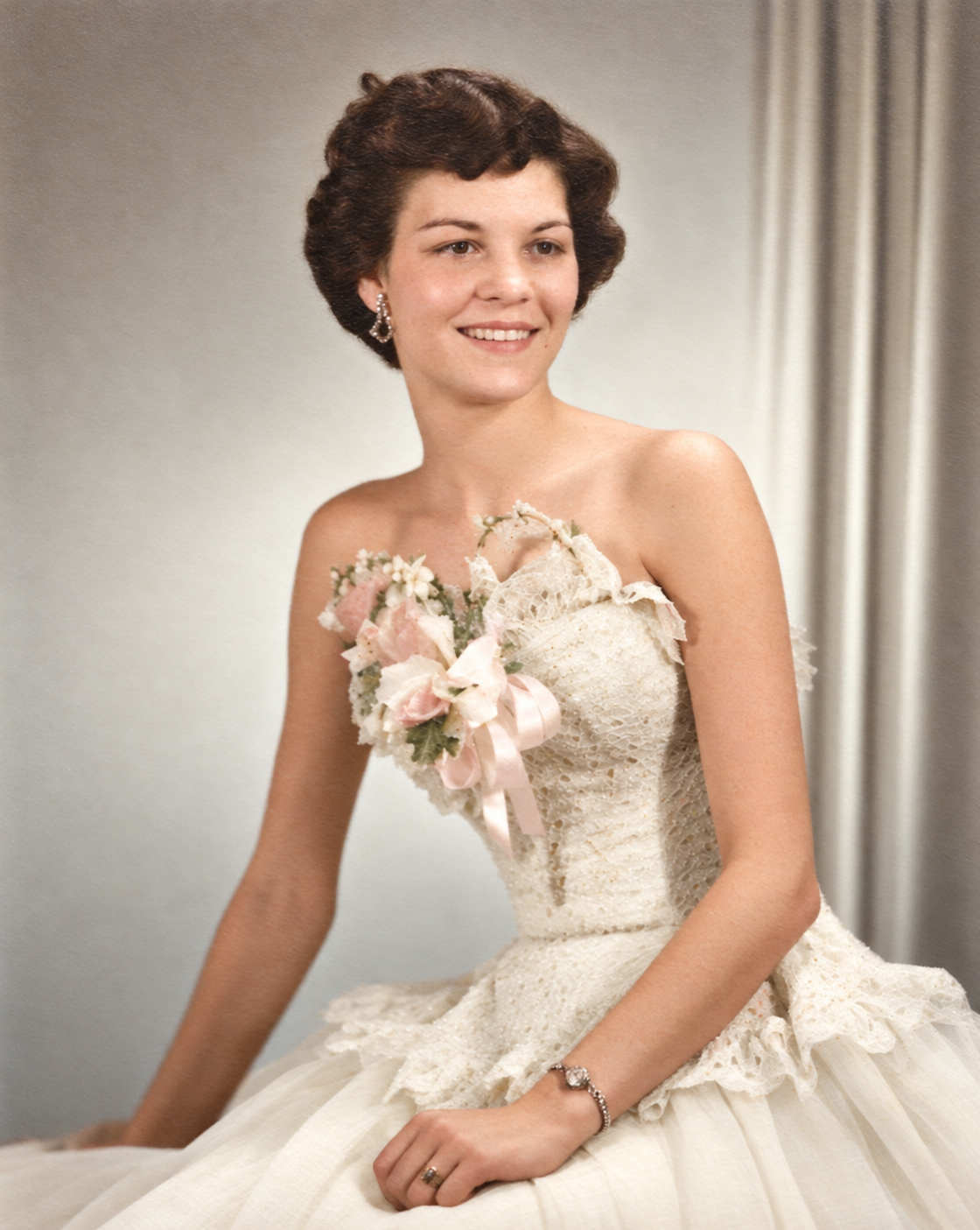 Patsy Ruth Anderson Childress in a colorized seated portrait, wearing a formal dress and corsage