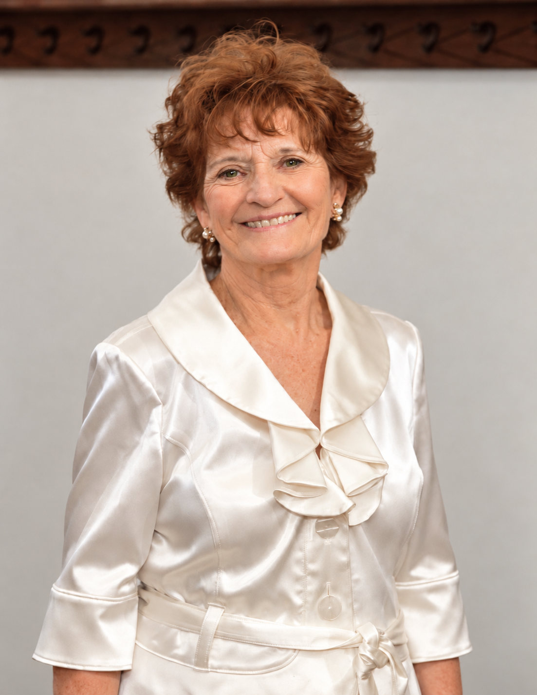 Wanda Dale Perry with green eyes and reddish hair — approved portrait