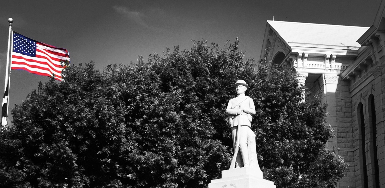 Hill County Courthouse and Confederate memorial in selective color